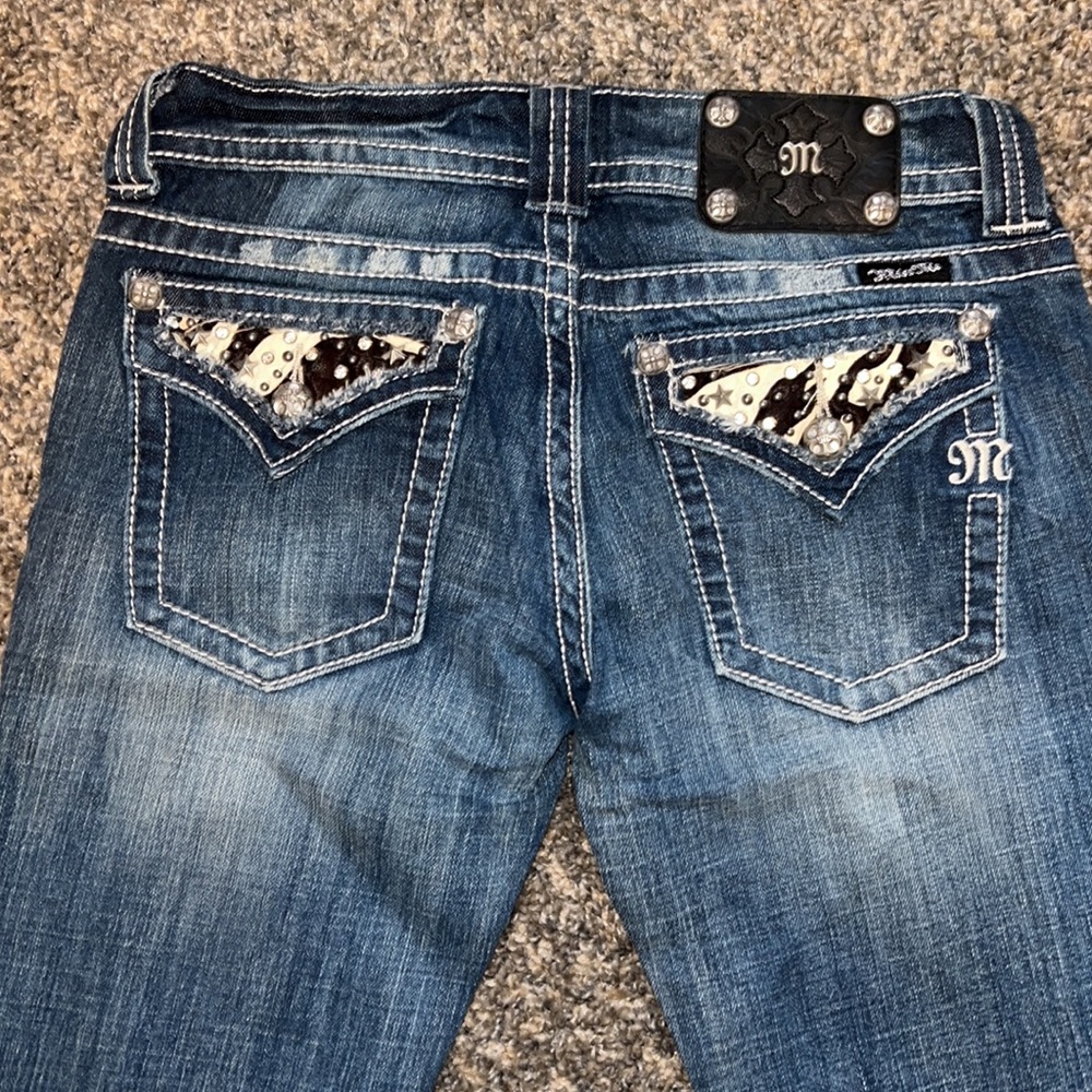 Cow print Miss Me jeans